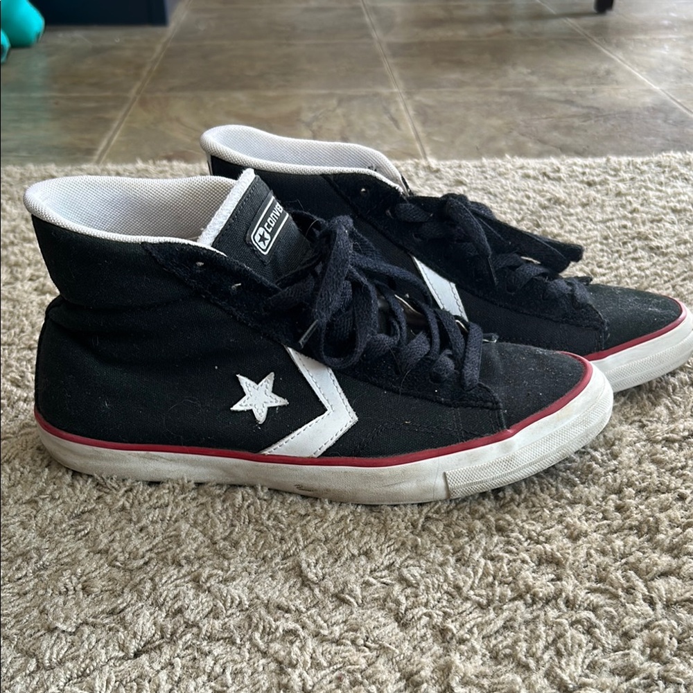 Converse Black and White Mid-Top Sneakers with Classic Silhouette